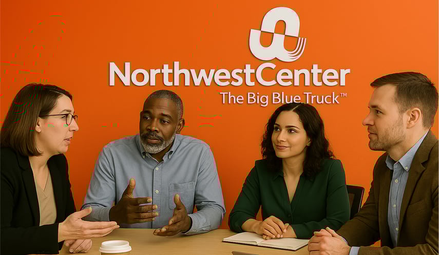 Diverse team of professionals having a discussion in a modern office at Northwest Center, with company branding and slogan "The Big Blue Truck" on an orange background.